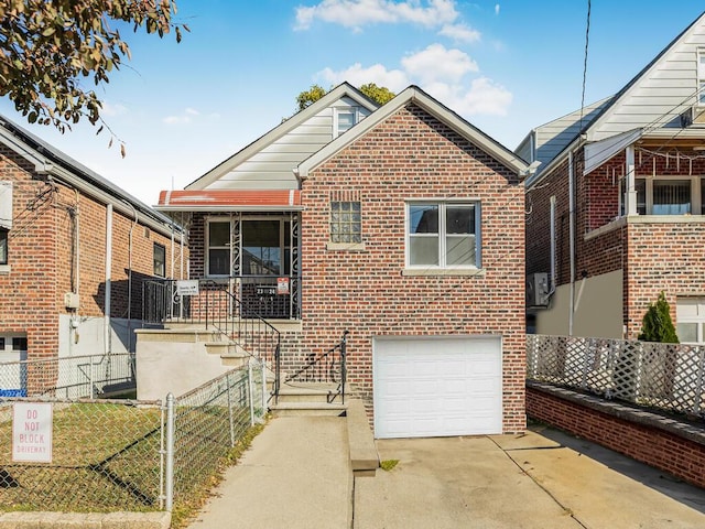 bungalow-style house featuring a garage