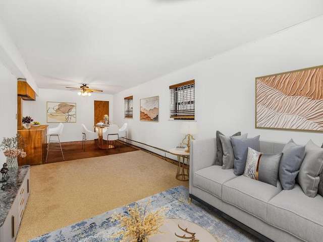 living room with carpet and ceiling fan