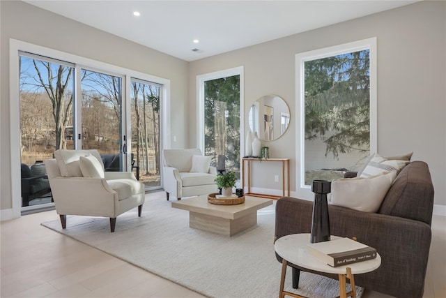 living room with light hardwood / wood-style flooring