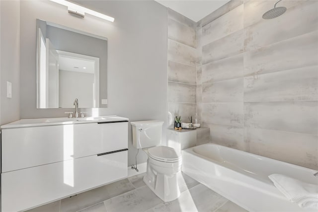 full bathroom featuring shower / bathing tub combination, vanity, and toilet