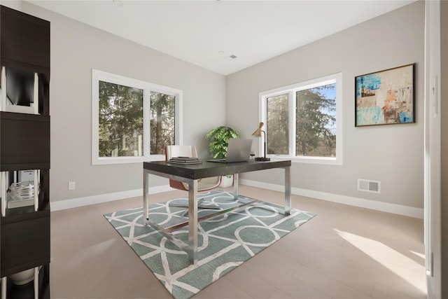 home office featuring hardwood / wood-style flooring