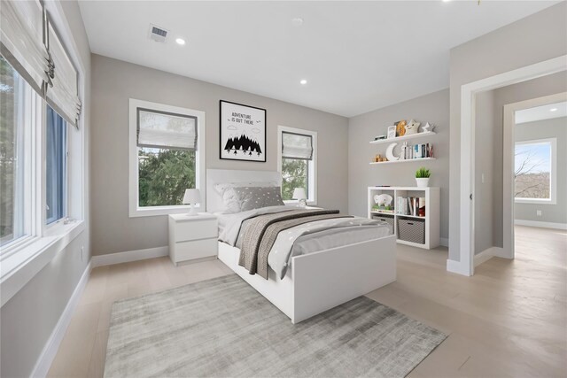 88 Byram Ridge Rd, Armonk, NY 10504 - bedroom with visible vents, baseboards, and multiple windows