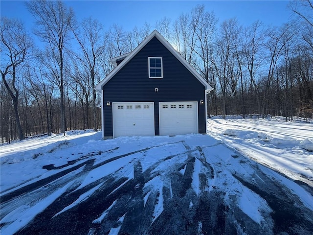 view of snow covered garage