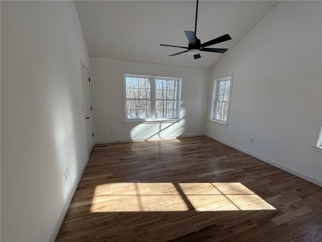 empty room with ceiling fan, high vaulted ceiling, and dark hardwood / wood-style floors