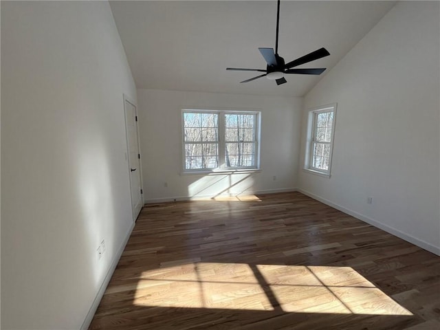 unfurnished room featuring dark hardwood / wood-style floors, high vaulted ceiling, and ceiling fan