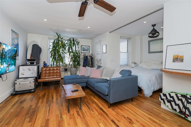 bedroom featuring ceiling fan and hardwood / wood-style flooring