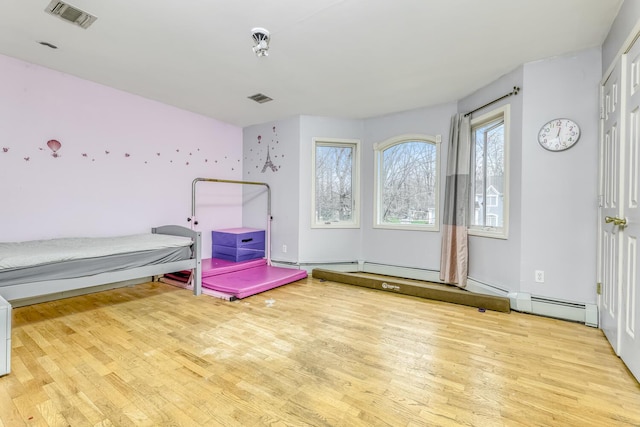 unfurnished bedroom featuring light wood-type flooring