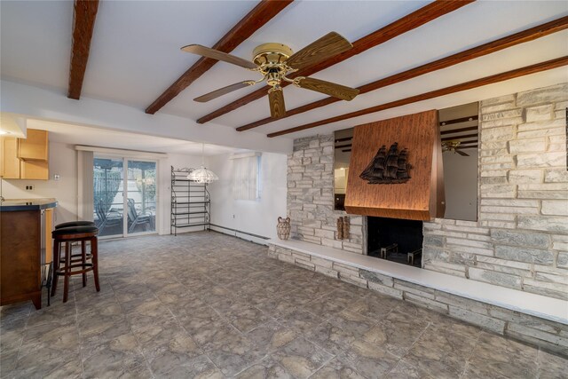 living room with beam ceiling and ceiling fan
