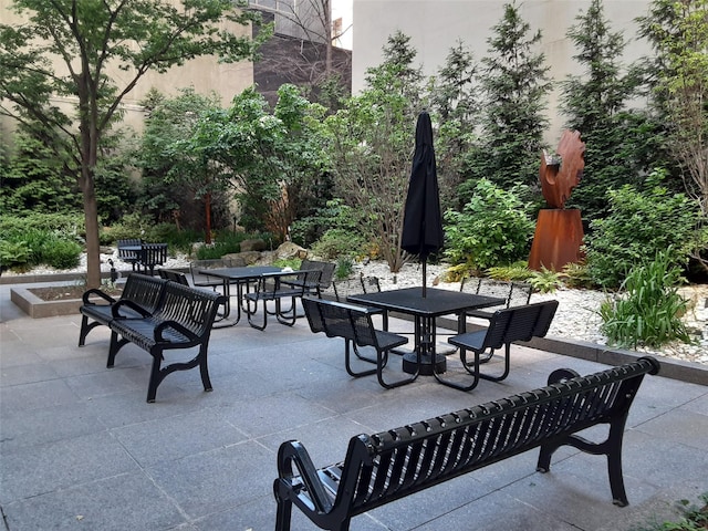 view of home's community featuring a patio area