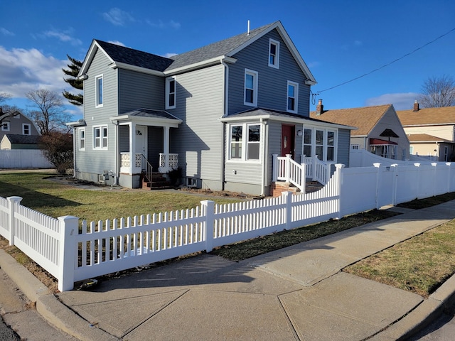 view of front of house with a front lawn