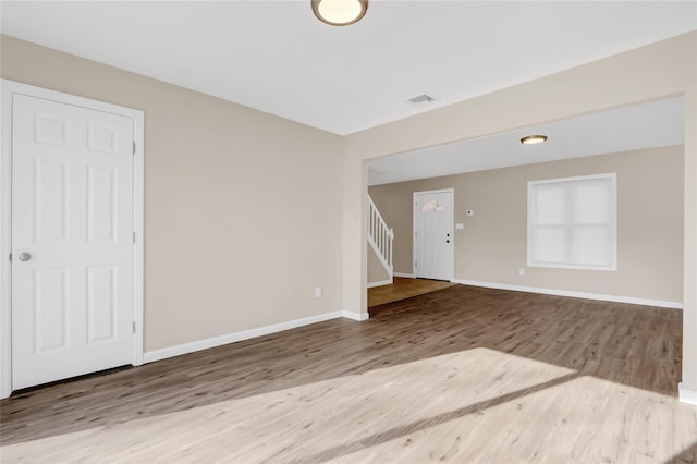 spare room with light wood-type flooring