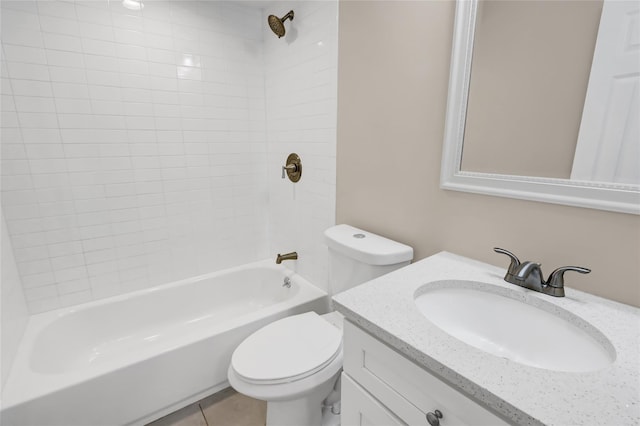 full bathroom with tile patterned floors, vanity, toilet, and tiled shower / bath combo