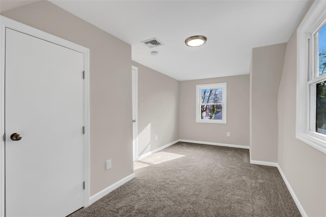 unfurnished bedroom with carpet flooring