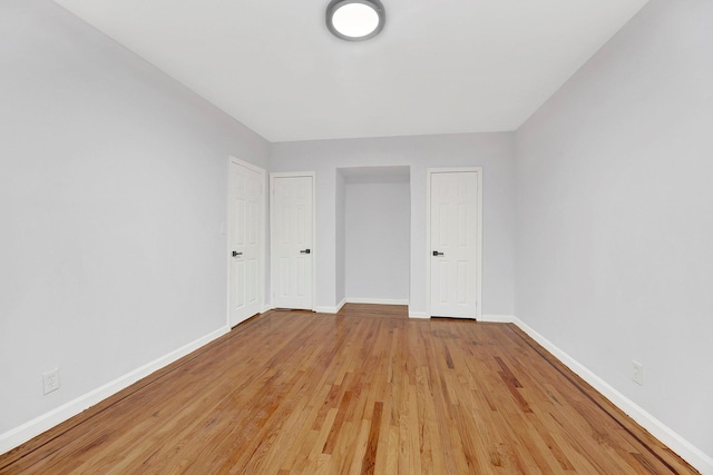 empty room with light wood-type flooring