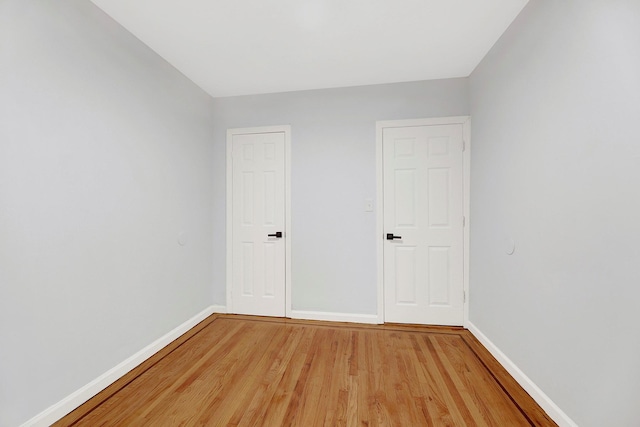 empty room featuring hardwood / wood-style floors