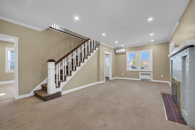 unfurnished living room featuring carpet flooring, radiator heating unit, ornamental molding, and an AC wall unit