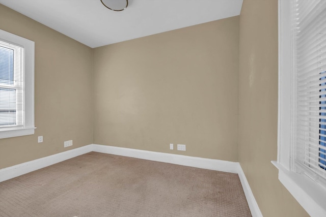 empty room featuring carpet floors