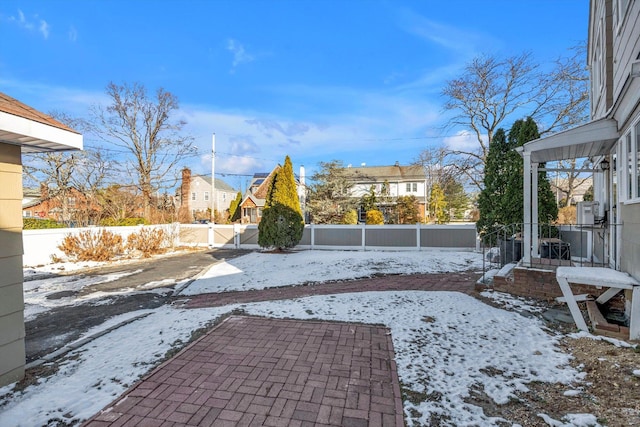 view of snow covered patio