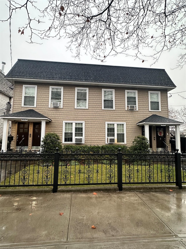 view of front of home featuring a front yard