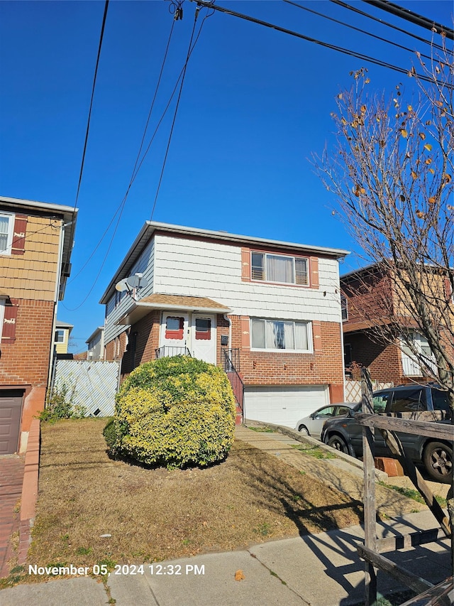 view of front of property featuring a garage