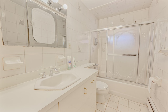 full bathroom with toilet, enclosed tub / shower combo, tile walls, tasteful backsplash, and a baseboard radiator