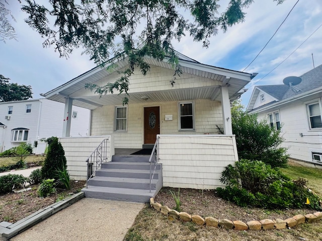 bungalow-style home featuring a porch