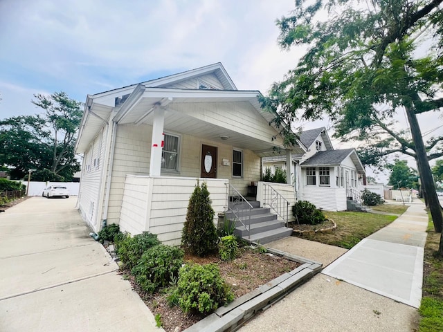 bungalow-style home with covered porch