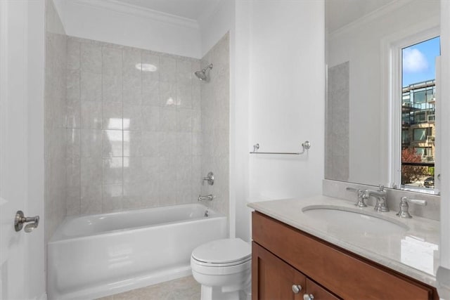 full bathroom with vanity, tiled shower / bath combo, toilet, and ornamental molding