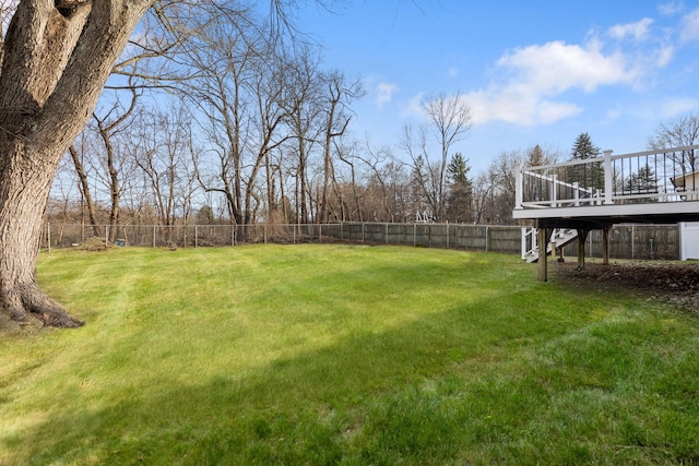 view of yard with a deck