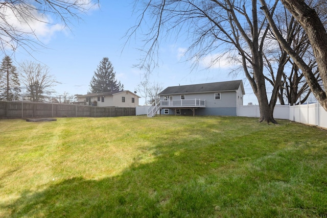 view of yard featuring a deck