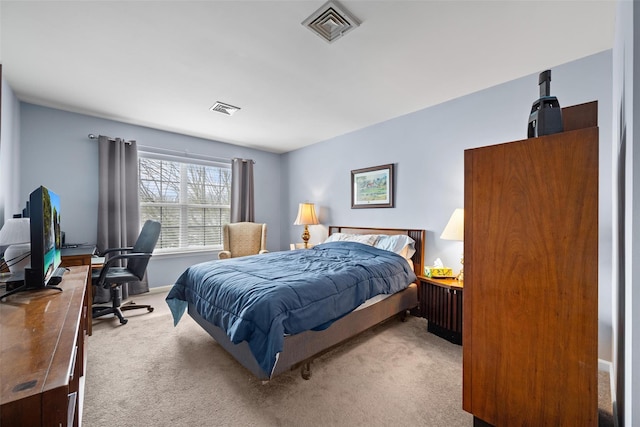 bedroom featuring light colored carpet