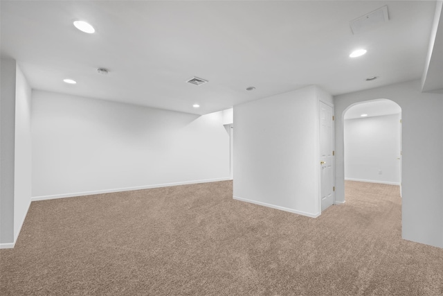 basement with light carpet