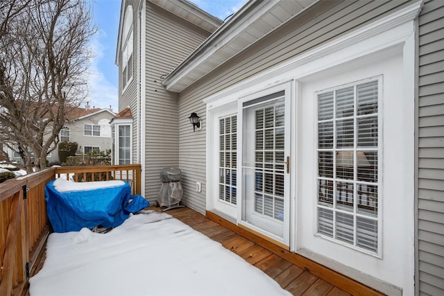 view of snow covered deck