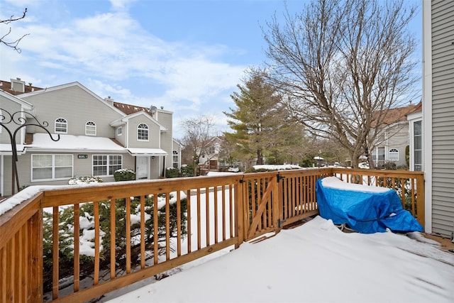 view of snow covered deck