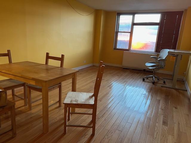 dining room with light wood-type flooring