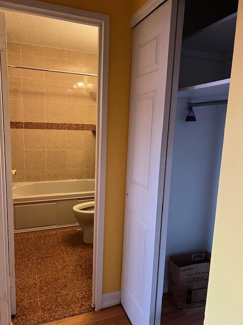 bathroom featuring toilet