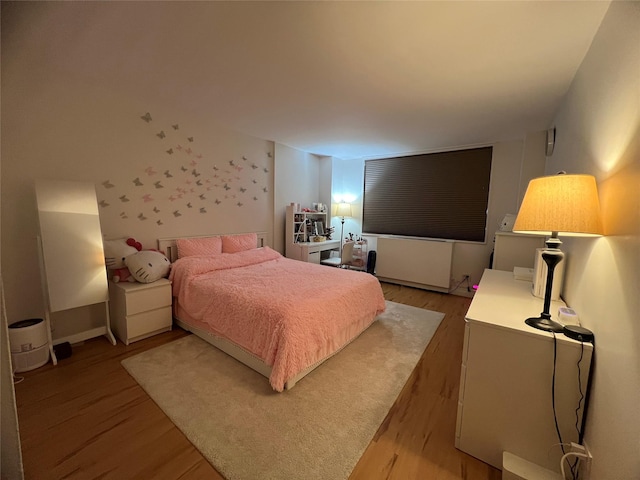 2 Bay Club Dr Unit 11F, Bayside, NY 11360 - bedroom featuring light wood finished floors