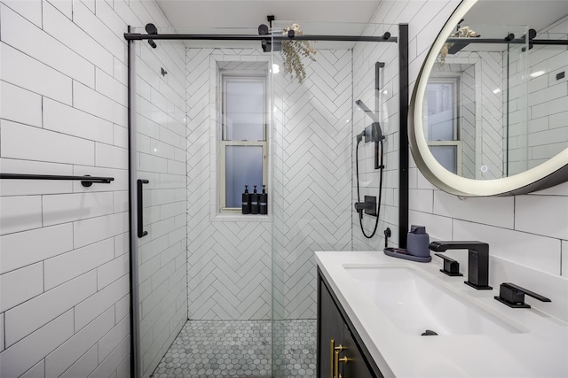 bathroom featuring vanity and walk in shower