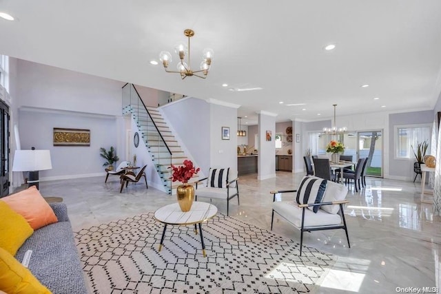 living room featuring a notable chandelier and crown molding