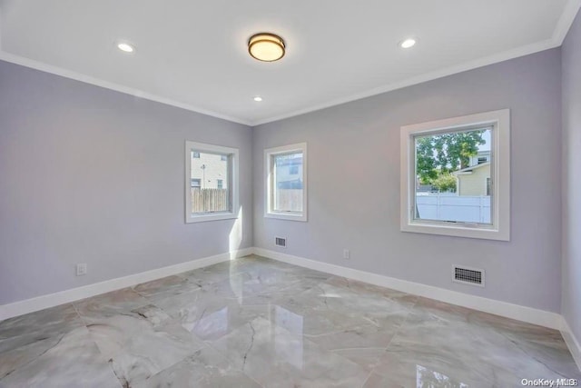 unfurnished room featuring crown molding and a healthy amount of sunlight