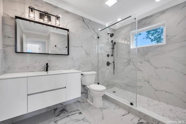 bathroom with a tile shower, crown molding, vanity, and toilet