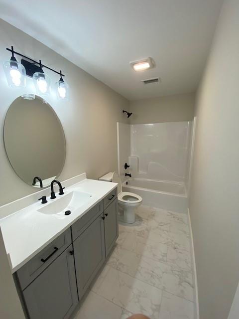 full bathroom featuring vanity, toilet, and shower / washtub combination