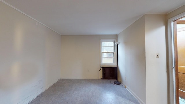 empty room featuring radiator heating unit