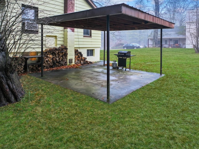 view of patio / terrace featuring a grill and a carport