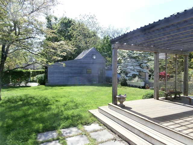 view of yard featuring a pergola and a wooden deck