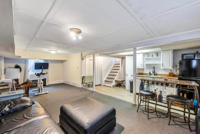 living room featuring sink