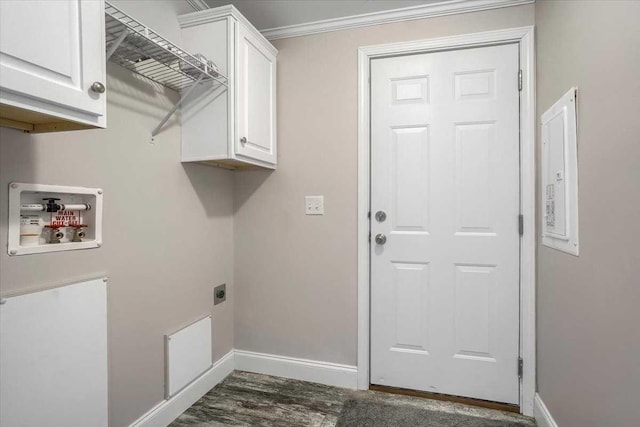 laundry area featuring electric dryer hookup, cabinets, washer hookup, ornamental molding, and dark hardwood / wood-style flooring