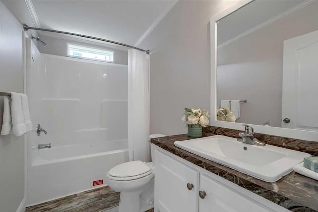 full bathroom with hardwood / wood-style floors, shower / bath combination with curtain, toilet, vanity, and ornamental molding