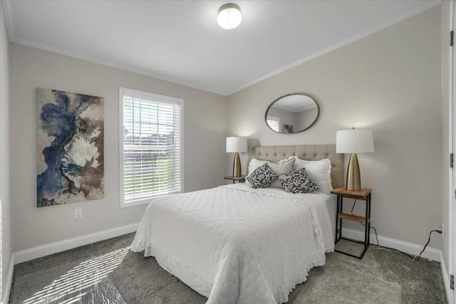 carpeted bedroom featuring ornamental molding