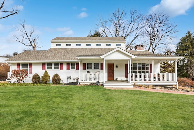 view of front facade featuring covered porch and a front lawn